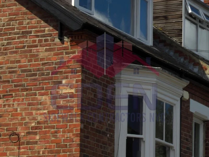 demonstration of a broken sidewalk after repaired